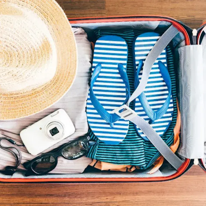 Clothes and such on an opened luggage