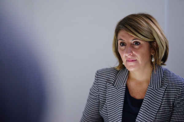 Professor Giulia Miniero listening to the students' presentations