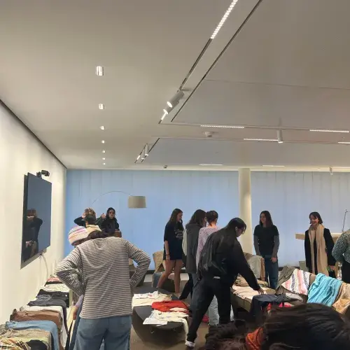 Students looking through swap items and clothes